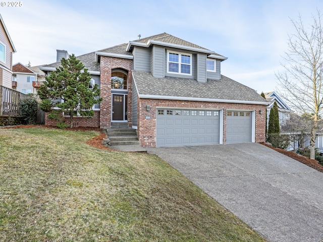 view of front of house with a garage and a front yard