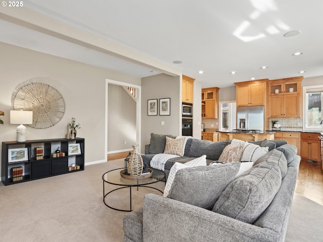 living room with light carpet