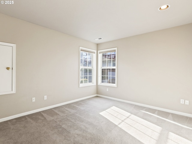 empty room featuring carpet