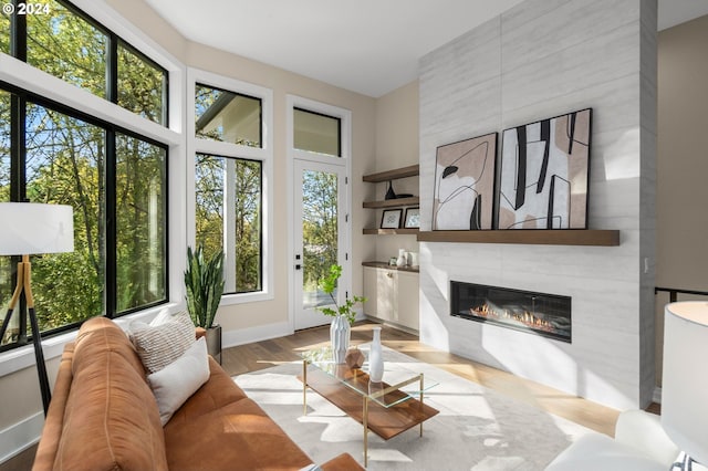 interior space featuring a tiled fireplace