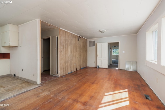 unfurnished living room with hardwood / wood-style floors