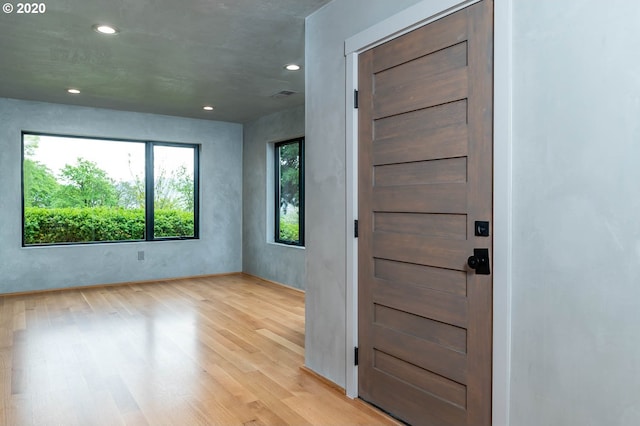 entrance foyer with light hardwood / wood-style floors