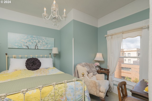 bedroom featuring a chandelier