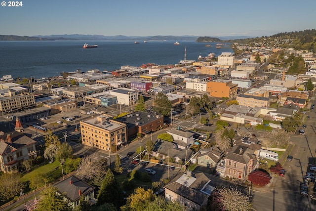 drone / aerial view featuring a water view