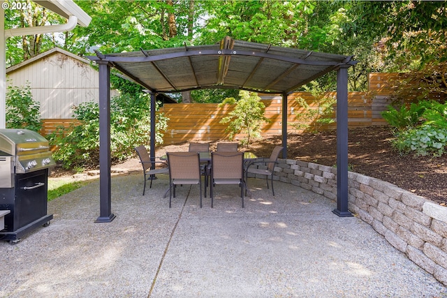 view of patio featuring a grill