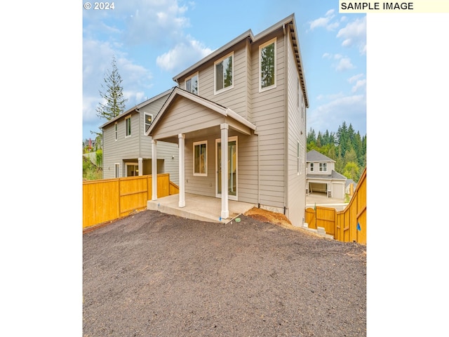 view of front of house featuring a patio