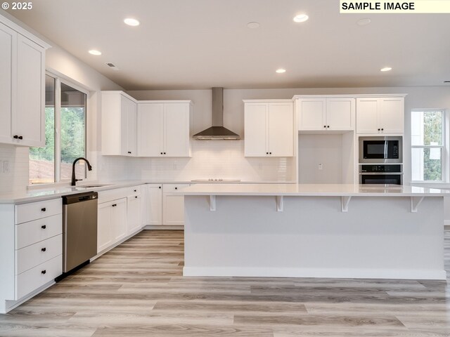 kitchen with decorative backsplash and white cabinetry