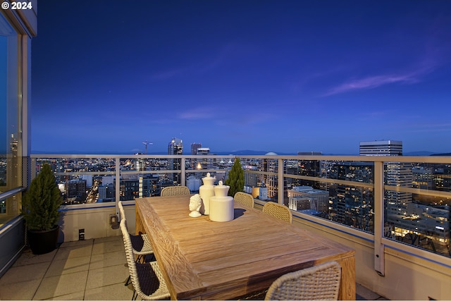 view of balcony at dusk