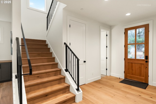 foyer with light wood-type flooring