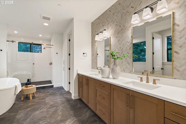 bathroom with shower with separate bathtub and vanity