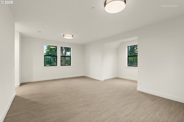 view of carpeted spare room