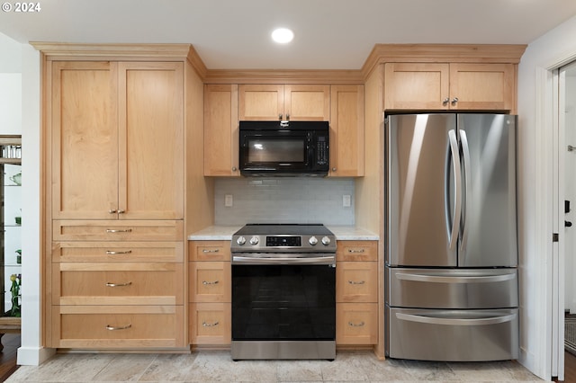kitchen with appliances with stainless steel finishes, light brown cabinets, recessed lighting, and tasteful backsplash