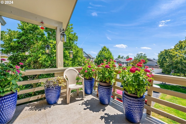 view of patio featuring a balcony