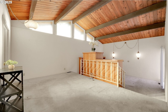 interior space with wooden ceiling, carpet flooring, and lofted ceiling with beams