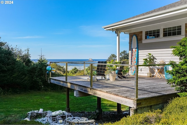 deck featuring a yard and a water view