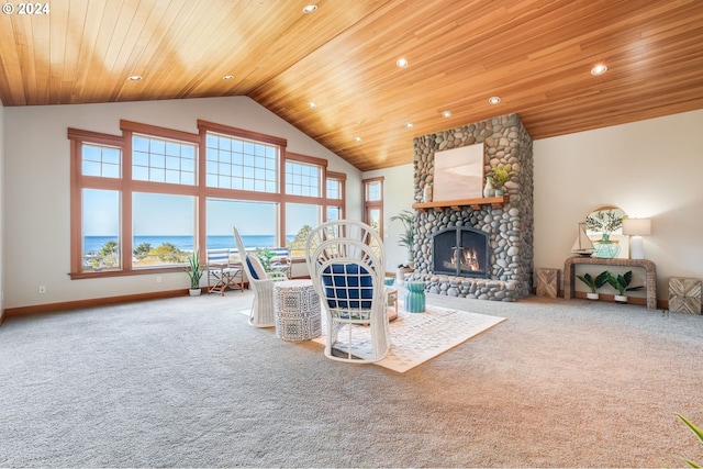 living room featuring wood ceiling, a water view, high vaulted ceiling, carpet floors, and a stone fireplace