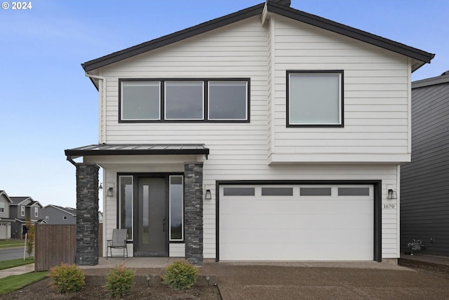 view of front of home with a garage