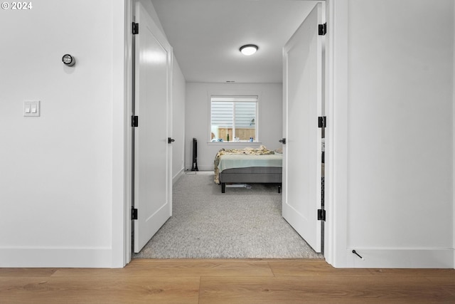 hallway featuring light hardwood / wood-style floors