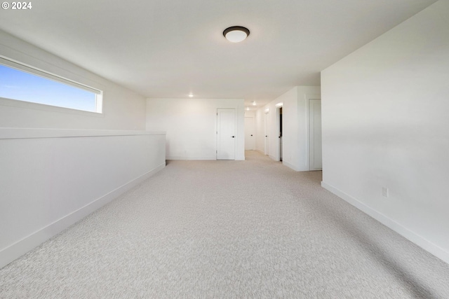 basement with light carpet