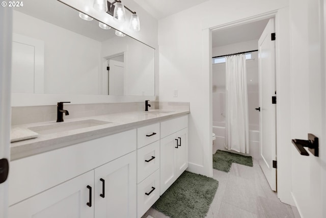 bathroom with vanity and shower / tub combo