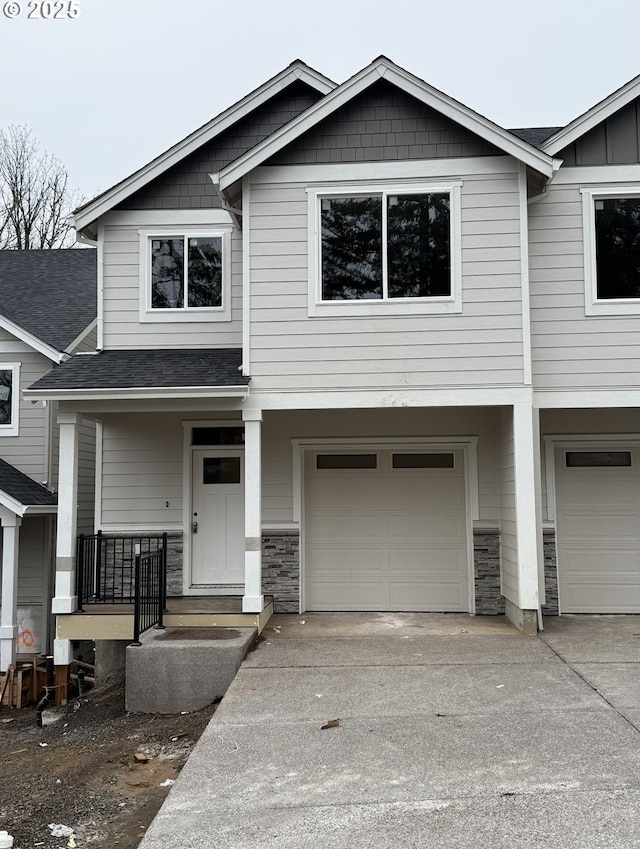 view of front of home with a garage