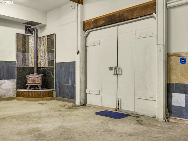 garage featuring a wood stove