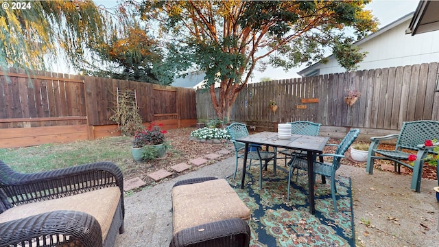 view of patio / terrace featuring a fenced backyard and outdoor dining area