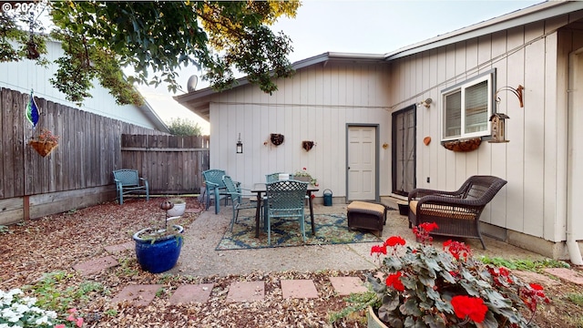 view of patio featuring fence