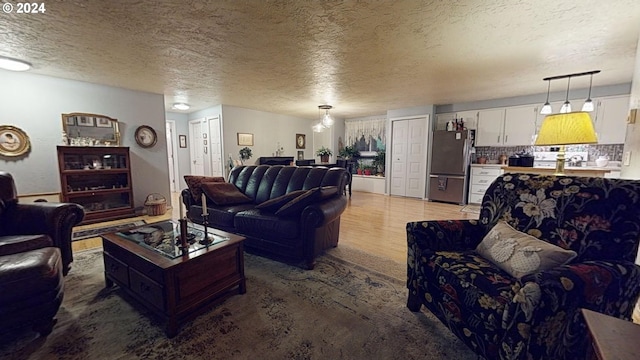 living room featuring a textured ceiling
