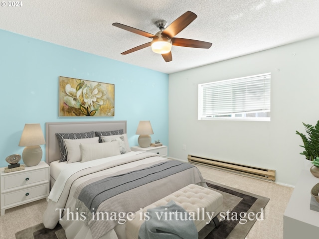 10940 SW Meadowbrook Dr Unit 29, Portland, OR 97224 - carpeted bedroom featuring a baseboard radiator, a textured ceiling, and ceiling fan