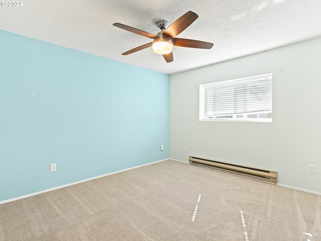 10940 SW Meadowbrook Dr Unit 29, Portland, OR 97224 - carpeted empty room with baseboard heating, a ceiling fan, a textured ceiling, and baseboards