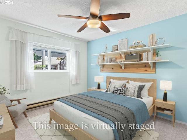 10940 SW Meadowbrook Dr Unit 29, Portland, OR 97224 - bedroom featuring a textured ceiling, ceiling fan, and carpet floors