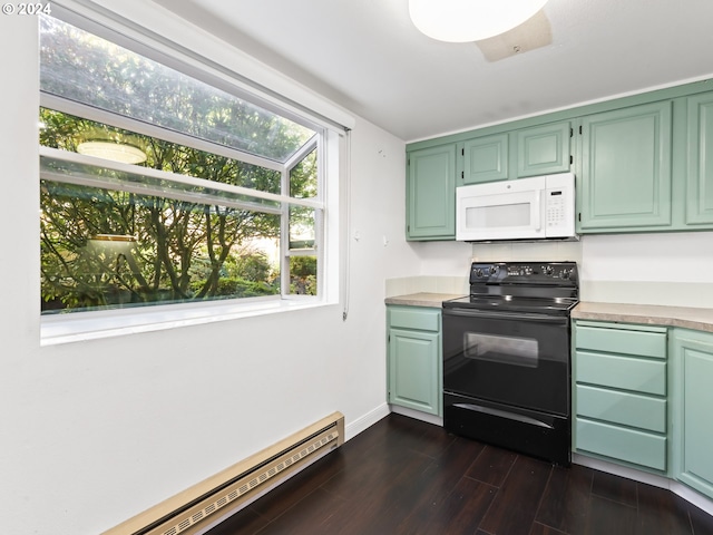 10940 SW Meadowbrook Dr Unit 29, Portland, OR 97224 - kitchen with white microwave, black electric range oven, a baseboard heating unit, dark wood finished floors, and light countertops