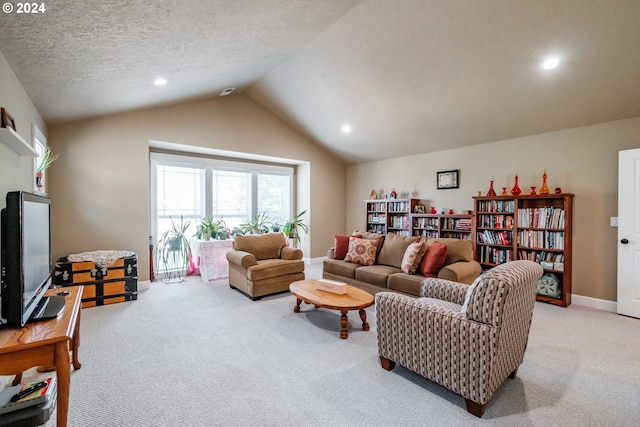 living room featuring light carpet, a textured ceiling, and vaulted ceiling