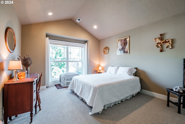 bedroom with carpet and vaulted ceiling