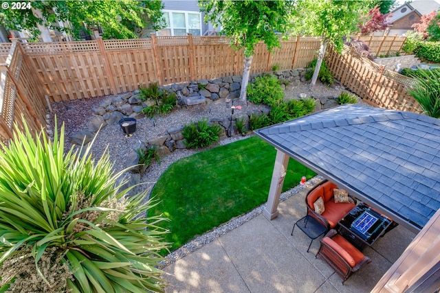 view of yard featuring a gazebo and a patio area