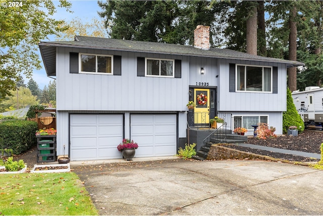 raised ranch featuring a garage