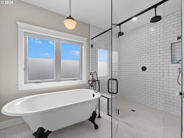 bathroom featuring separate shower and tub and tile patterned floors