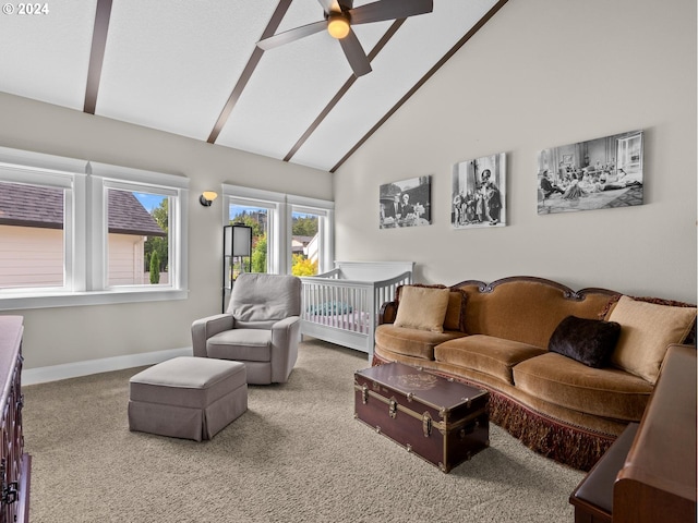 living room featuring high vaulted ceiling, carpet, and ceiling fan