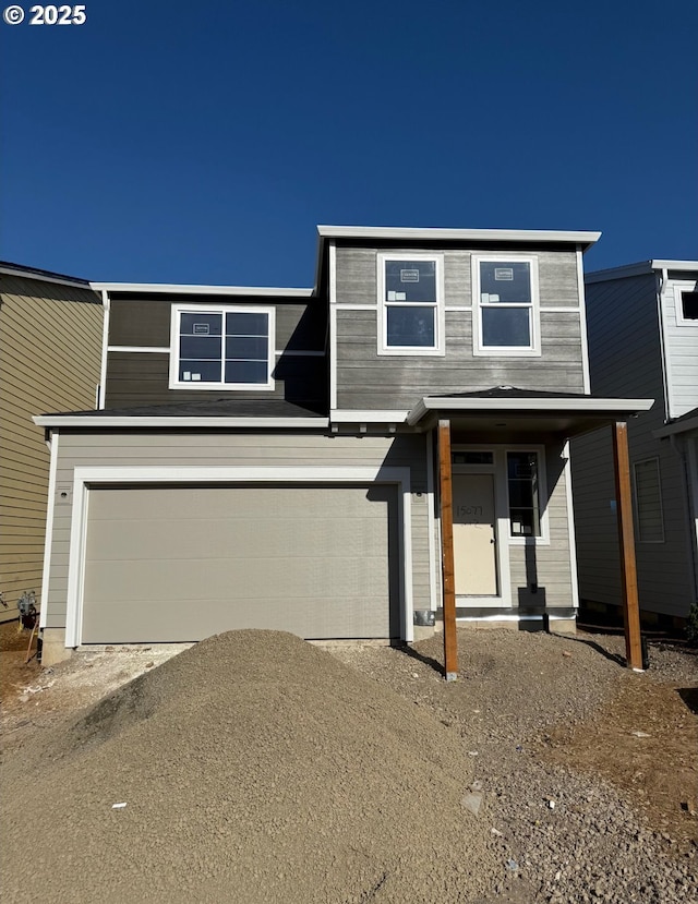 13886 SW Sabrina Ave, Tigard, OR 97140 - view of front of home featuring driveway and a garage
