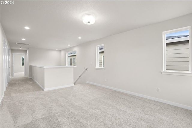 13886 SW Sabrina Ave, Tigard, OR 97140 - empty room featuring baseboards and light colored carpet
