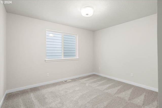 13886 SW Sabrina Ave, Tigard, OR 97140 - carpeted spare room with baseboards and visible vents