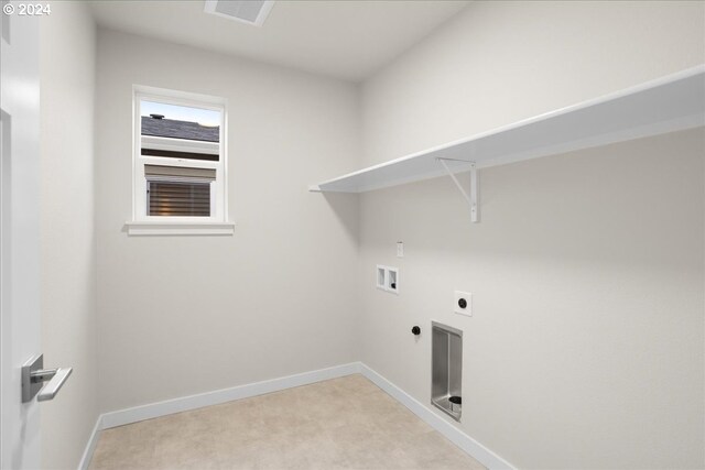 unfurnished bedroom with a textured ceiling, light colored carpet, and a closet