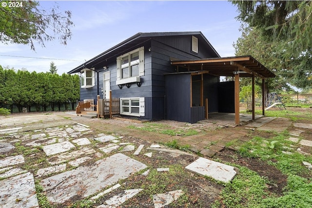 exterior space featuring fence and a patio area