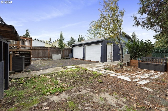 detached garage with fence