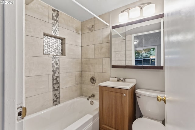 bathroom featuring shower / bathtub combination, vanity, and toilet