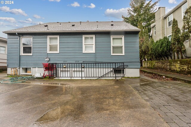 rear view of property with a patio area