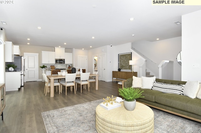 living room with hardwood / wood-style flooring