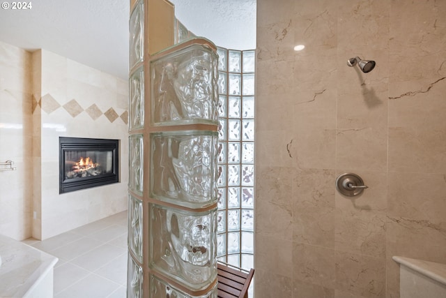 bathroom featuring a tile shower