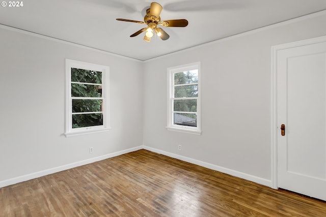 1212 Laurel St Unit 9, Lake Oswego, OR 97034 - spare room featuring baseboards, wood finished floors, ceiling fan, and ornamental molding